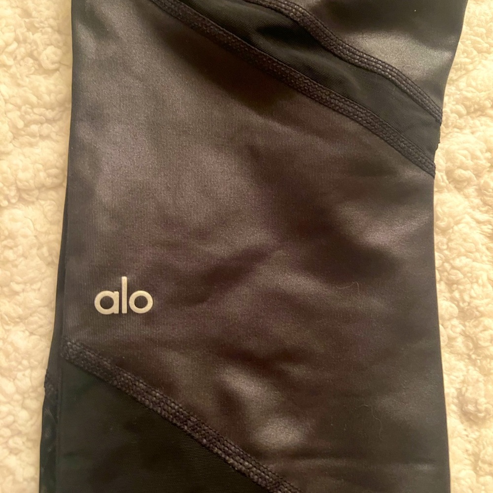 Alo size Medium yoga pants with faux leather and mesh detail